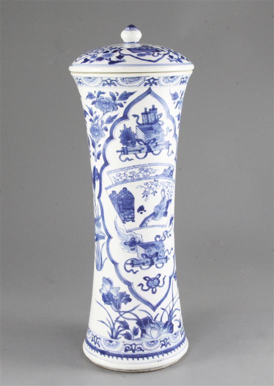 A tall Chinese blue and white waisted cylindrical jar and cover, Kangxi period, height 38cm